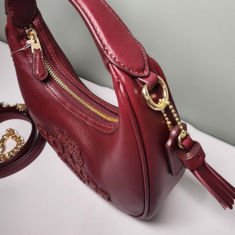 NWT Coach CCE60 Carmen Mini Crossbody Beaded Coach Graphic In DARK WINE Leather - Picture 5 of 7